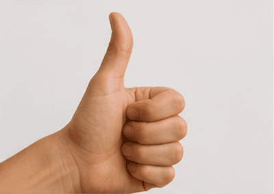 A thumbs-up gesture — meaning good