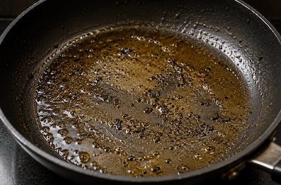 A pan with cooking grease or oil