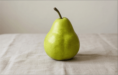 A ripe green pear — the fruit