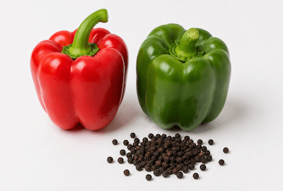 Red and green peppers and a pepper shaker