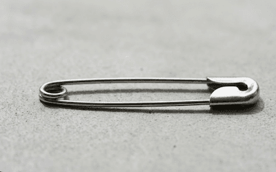 A small sharp metal pin