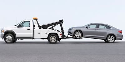 A tow truck towing a car