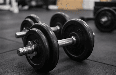 A set of gym weights — measuring how heavy something is